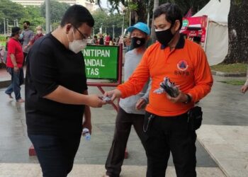 BNPB Distribusikan 53 Ribu Masker Saat Libur Panjang