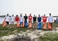 Jajaran Pembalap dan Tim Formula E Bersihkan Pantai di Kawasan Sirkuit Jaya Ancol