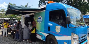 Layanan Adminduk Keliling Dispendukcapil Jember Disambut Warga